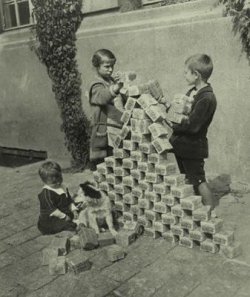 $1923-Children-playing-with-currency.jpg