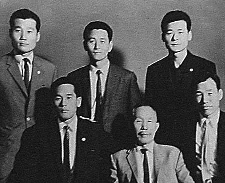 First Row: Master Kim (left), Young Sul Choi (center), and Bong Soo Han (Back Center)